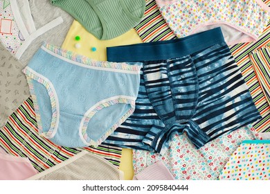 Underwear For Girls And Boys. Children's Underwear Piled Up In A Pile. Clothes In The Form Of Children's Underwear.