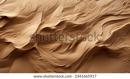 Undulating Sahara desert dunes fade into the distance under dramatic sunset skies, creating a striking natural backdrop.