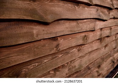 Unedged Planks Background. Wooden Scandinavian Fence. Brown Color Board. Grunge Texture. Flat Lay Mockup Design. Horizontal Line. Backyard Hedge. Countryside Security Exterior. Chalet Or Rustic Style.