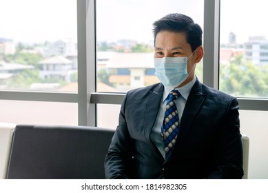 Unemployed man, he is very sad and thinking because the corona outbreak of the Covid-19 virus is the cause of new normal around the world. Causing many unemployed. mental man wait for job interview  - Shutterstock ID 1814982305