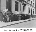 Unemployed single women in New York demonstrate for public works jobs. Some placards read "Forgotten women," because public policy focused only on men