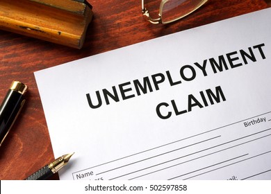 Unemployment Claim Form On An Office Table.