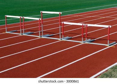 Unequal Hurdles On Race Track