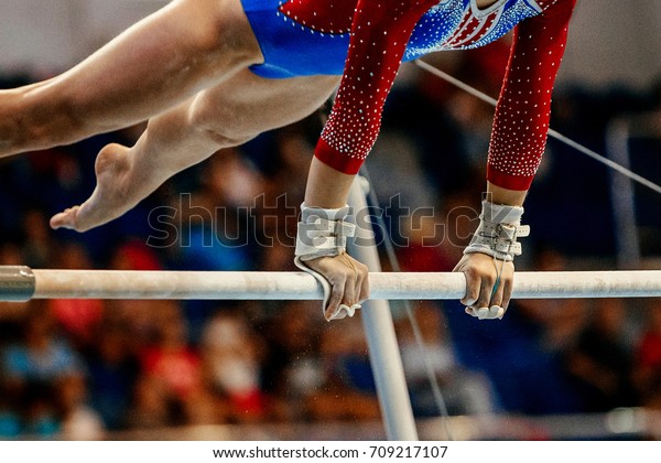 uneven bars athlete gymnast to competition in\
artistic gymnastics