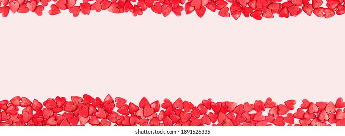 Uneven Border Of Heart Shaped Red Sprinkles On Background Banner, Festive Love Gift And Valentine's Day Concept. Banner Mockup. Small Hearts. Minimal Romantic Concept Mockup