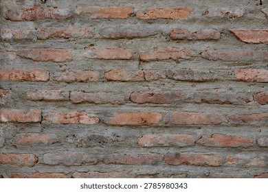 The uneven texture and mortar lines create a rich visual pattern. This seamless texture is ideal for design projects, mockups, and interior decoration backgrounds.