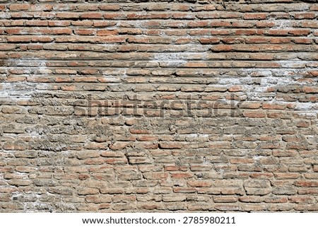 The uneven texture and mortar lines create a rich visual pattern. This seamless texture is ideal for design projects, mockups, and interior decoration backgrounds.