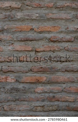 The uneven texture and mortar lines create a rich visual pattern. This seamless texture is ideal for design projects, mockups, and interior decoration backgrounds.