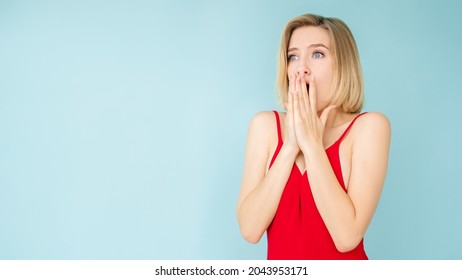 Unexpected News. Shocked Woman. Wow Expression. Advertising Background. Surprised Lady Red Slipdress Covering Mouth Hands Isolated Blue Copy Space.