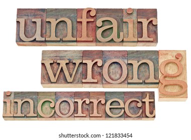 unfair, wrong, incorrect - negative words - isolated text in vintage letterpress wood type blocks