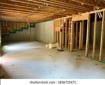 Unfinished Basement With Wood And Cement