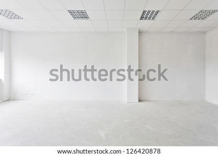 Unfinished building interior, white room.