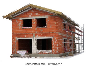 Unfinished building of a red brick rural house in the winter. Isolated on white. Mass production