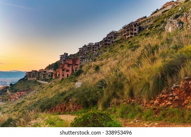 Unfinished House Ruins Raised By The Mafia Through Corruption On A Hill Near Palermo. Sicilian Landscape Near Mondello, Italy