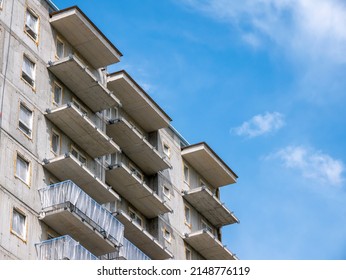 Unfinished Simple Generic Real Estate Building, Apartments, Housing, New Block Of Flats Under Construction, Facade Closeup, Detail, Sunny Day, Nobody, No People. Building Exterior, Balconies