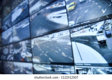 Unfocused Image With Security Surveillance Monitors Command Center