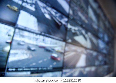 Unfocused Image With Security Surveillance Monitors Command Center