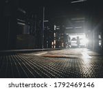 unfocused image of silhouette of the dark gym background with the sunlight  upon gym floor