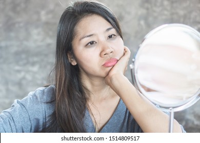 Unhappy Asian Woman Age 40 Checking Her Dark Eyes Circle Problem In Mirror 