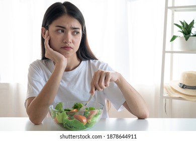 Unhappy Asian Women Is On Dieting Time, She Doesn't Want To Eat Vegetables.