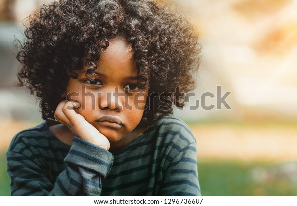 Unhappy Bored Little African American Kid Stock Photo Edit Now