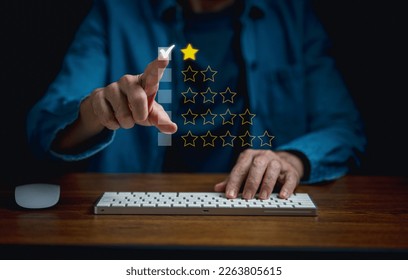 Unhappy Client hand using desktop and give one star symbol for  dissatisfied of product and service concept, bad review,bad  service ,bad quality,low rating. - Shutterstock ID 2263805615