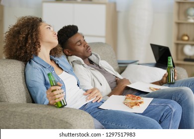 Unhappy Couple Ate Too Much Pizza