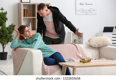 Unhappy Couple Having Argument At Home. Concept Of Divorce