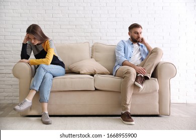 Unhappy Couple With Problems In Relationship At Home