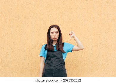 

Unhappy Employee Holding Thumbs Down Protesting. Upset Minimum Wage Worker Showing Disapproval For Working Conditions

