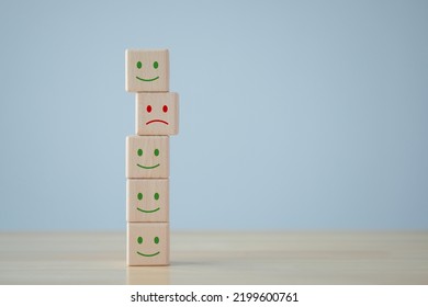 Unhappy Face Is Among Happy Face. Customer Dissatisfaction Or Unhappy Client. Feedback Rating, Satisfaction, Customer Service Review, Mental Health Assessment, World Mental Health Day Concept.