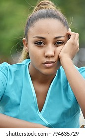 Unhappy Hispanic Female Nurse