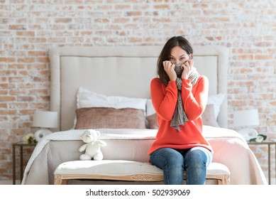 Unhappy Ill Woman Wearing A Scarf