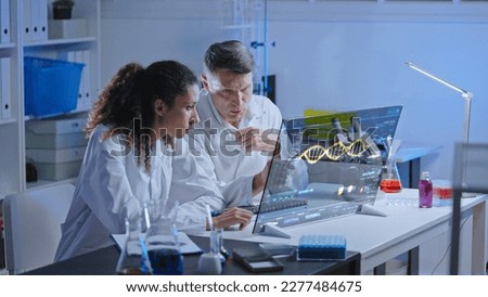 Unhappy lab scientists looking at dna structure on screen, experiment failure