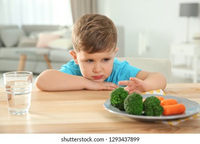 Unhappy Little Boy Refusing Eat Vegetables Stock Photo 1298067502 ...