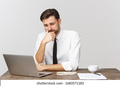 unhappy male working in the office, looking at the camera, front view, isolated on white.