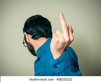 Unhappy Man With Middle Finger Gesture