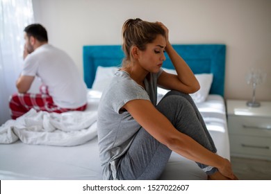 Unhappy Married Couple And Sexual Problems Concept. Frustrated Man And Woman Not Talking Feeling Offended Or Stubborn. Concept Of Impotence. Man Have Problems.