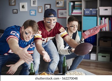 Unhappy Men While Watching American Football