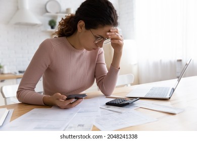 Unhappy Millennial Female Frustrated With Financial Mistake Calculating Household Expenses Paying Online. Upset Confused Young Caucasian Woman Have Problems With Bankruptcy Or Finances Debt.