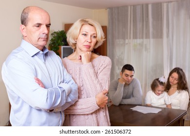 Unhappy Multigenerational Family With Grandparents And Kids Having Financial Problems