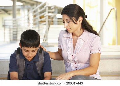 Unhappy Pre Teen Boy In School