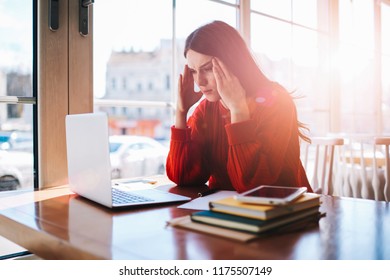 Unhappy Puzzled Female Programmer Have Problem With Downloading File On Laptop Computer, Worried Woman Software Developer Creating New Website Doing Mistake And Feeling Disappointed At Cafeteria