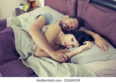 Unhappy Sad Woman In Bed With Sleeping Boyfriend Depressed