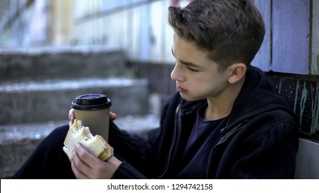 Unhappy Schoolboy Eating Snack, Fast Food, Unhealthy Nutrition For Child