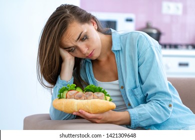 Unhappy Stressed Woman Eating Unhealthy Food Because Of Depression And Stress. Nerve Food. Life Problems And Difficulties. Food Addiction 