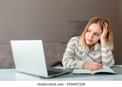 Unhappy Teen Girl During Home Online Education Using Laptop. Stress Sadness Female Student Do Homework Classes. Sad Woman Work Remote From Home