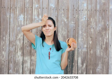 Unhappy Woman Staining Her Favorite Shirt With Ketchup Sauce. Clumsy Young Person Spilling Tomatoes Ace All Over Her Blouse
