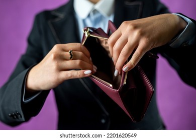 Unhappy Young Bankrupt Woman With Empty Wallet Or Showing Her Empty Wallet.. Poverty. Have No Money