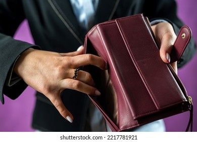 Unhappy Young Bankrupt Woman With Empty Wallet Or Showing Her Empty Wallet.. Poverty. Have No Money